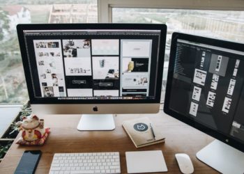 Turned-on Silver Imac and Magic Keyboard With Mouse