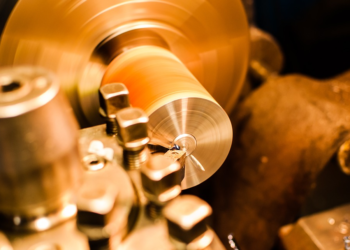 What is a CNC lathe, and how does it work?